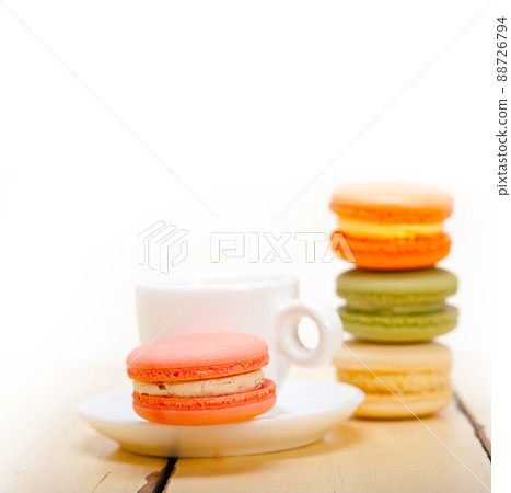 colorful macaroons with espresso coffee colorful macaroons with espresso coffee 88726794