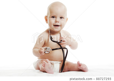 Infant child baby toddler sitting with medical stethoscope for physical therapy test isolated on a white background 88727293