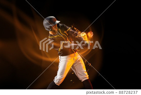 Professional baseball player in sports equipment training alone isolated on dark background with mixed light effect. Sport, art, action, hobby concept 88728237