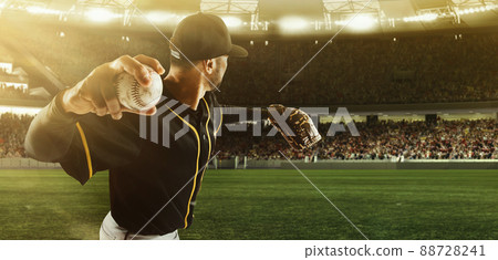 Professional baseball player taking a shot during match in crowed sport stadium at evening time. Sport, win, winner, competition concepts. 88728241