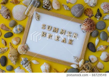 Composition sheet white paper text SUMMER BREAK, seashells, pebbles, mockup on yellow background. Blank, top view, still life, flat lay. sea vacation travel concept tourism and resorts. 88729549