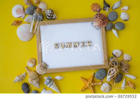 Composition sheet white paper text SUMMER, seashells, pebbles, mockup on yellow background. Blank, top view, still life, flat lay. sea vacation travel concept tourism and resorts. Composition sheet white paper text SUMMER, seashells, pebbles, mockup on yellow background. Blank, top view, still life, flat lay. sea vacation travel concept tourism and resorts. 88729552
