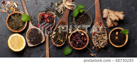 Various dried tea in wooden spoons Various dried tea in wooden spoons 88730285