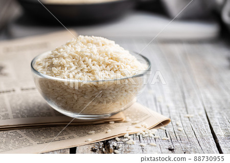 Uncooked Carnaroli risotto rice in glass bowl. Uncooked Carnaroli risotto rice in glass bowl. 88730955