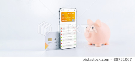 Online payment. Mobile phone with internet online bank app. Pig bank with credit card on white background. Online wallet save money. Online payment. Mobile phone with internet online bank app. Pig bank with credit card on white background. Online wallet save money. 88731067