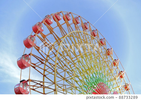 Ferris wheel and blue sky looking up 88733289