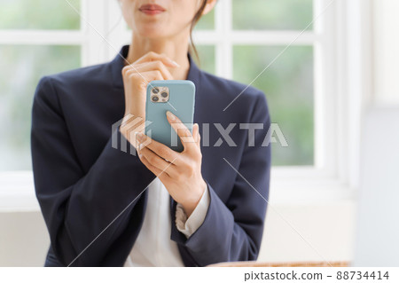 Women with smartphone parts cut 88734414