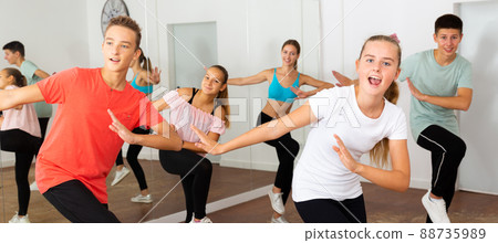 Teenage boys and girls dancing group choreography 88735989
