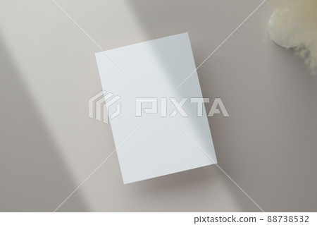 Blank greeting card invitation Mockup 5x7 on envelope with dry flowers and ribbon on paper background, flat lay, mockup Blank greeting card invitation Mockup 5x7 on envelope with dry flowers and ribbon on paper background, flat lay, mockup 88738532