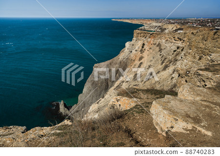 View of Crimean rugged rocky from top of the cliff on Fiolent cape in spring. Sevastopol, Crimea View of Crimean rugged rocky from top of the cliff on Fiolent cape in spring. Sevastopol, Crimea 88740283