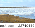 Colorado landscape of frozen lake reservoir with overcast blue sky 88740439