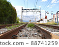 Azumino station railroad tracks and countryside scenery 88741259