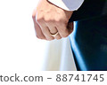 Wedding determination left hand fist and engagement ring 88741745