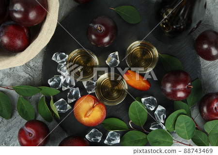 Concept of alcohol with plum vodka, top view 88743469