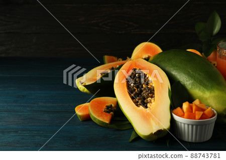 Fresh papaya on wooden table, space for text Fresh papaya on wooden table, space for text 88743781