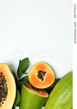 Fresh ripe papaya on white table, space for text Fresh ripe papaya on white table, space for text 88743815
