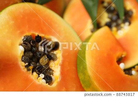 Fresh papaya all over background, close up Fresh papaya all over background, close up 88743817