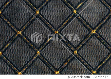 yellow-black fabric with rhombuses background for design 88744416