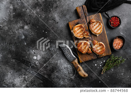 Meat fried pork set, on black dark stone table background, top view flat lay, with copy space for text Meat fried pork set, on black dark stone table background, top view flat lay, with copy space for text 88744568