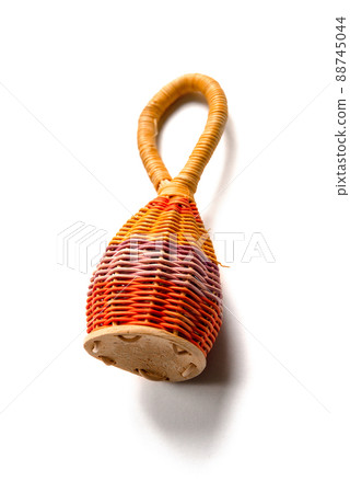 Traditional colorful braided caxixi isolated on white Traditional colorful braided caxixi isolated on white 88745044