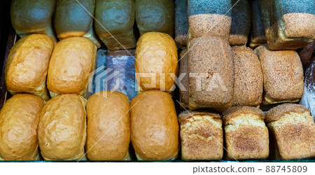 Loafs of bread from Russia on counter in supermarket Loafs of bread from Russia on counter in supermarket 88745809