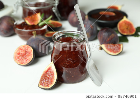 Concept of tasty food with fig jam on white background Concept of tasty food with fig jam on white background 88746901