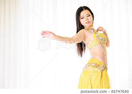 Asian woman dancing belly dance Asian woman dancing belly dance 88747680