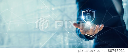 Businessman holding Shield with padlock in hand on global networking connection, Data protection and network security, insurance business, internet fire wall and crime cyber protection. 88748911