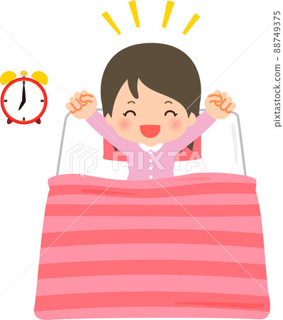 A smiling woman who gets up and stretches on a futon 88749375