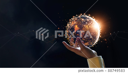 .Businessman holding night earth and global networking connection and data exchanges, global communication network concept, Elements of this image furnished by NASA. .Businessman holding night earth and global networking connection and data exchanges, global communication network concept, Elements of this image furnished by NASA. 88749583