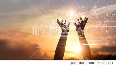 Abstract business and science, Media, big idea and inspiration, Hands holding light bulbs on digital global network connection on sunset background, Technology, Telecommunication, Networking and Abstract business and science, Media, big idea and inspiration, Hands holding light bulbs on digital global network connection on sunset background, Technology, Telecommunication, Networking and 88749584