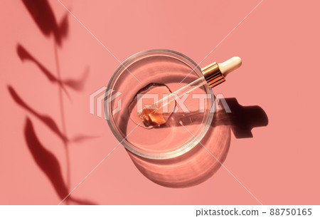 Laboratory glass petri dish with pipette and drop of water, serum, oil, beauty product. Natural medicine, cosmetic research, bio science. Skincare and analysis concept. Dermatology. Flat lay, top view 88750165