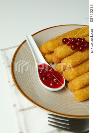 Concept of tasty food with cheese sticks on white background 88750258