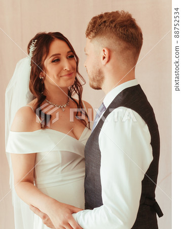 beautiful young wedding couple at restaurant grain effect beautiful young wedding couple at restaurant grain effect 88752534
