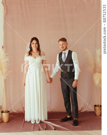 beautiful young wedding couple at restaurant grain effect beautiful young wedding couple at restaurant grain effect 88752535