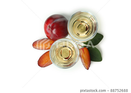 Plum vodka shots isolated on white background Plum vodka shots isolated on white background 88752688
