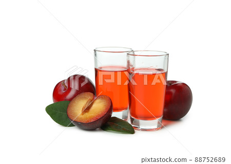 Plum brandy shots isolated on white background Plum brandy shots isolated on white background 88752689