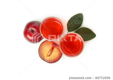 Plum brandy shots isolated on white background Plum brandy shots isolated on white background 88752690