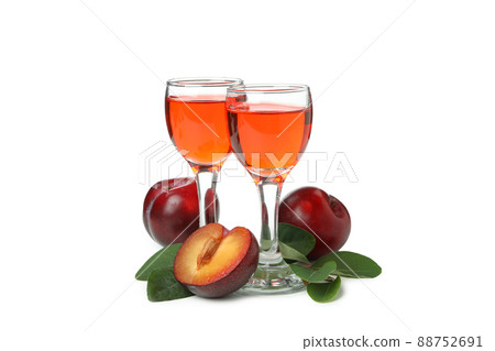 Plum brandy shots isolated on white background Plum brandy shots isolated on white background 88752691