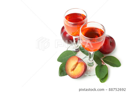 Plum brandy shots isolated on white background Plum brandy shots isolated on white background 88752692