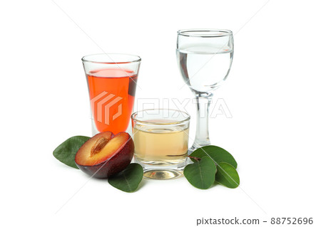 Plum alcohol shots isolated on white background Plum alcohol shots isolated on white background 88752696