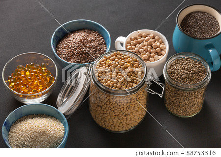 Source of vitamin E and nutrients in bowls on the table, copy space Source of vitamin E and nutrients in bowls on the table, copy space 88753316