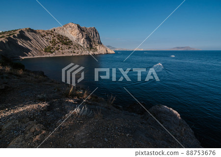 View of Mount Eagle In the resort village of Novy Svet in Crimea on the Black Sea coast View of Mount Eagle In the resort village of Novy Svet in Crimea on the Black Sea coast 88753676