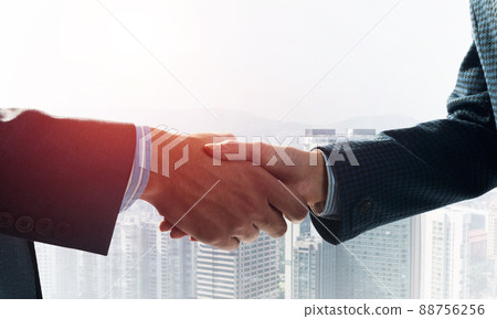 Close-up of the handshake of businessmen. 88756256