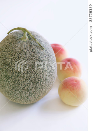 Early summer fruit, melon and peach [white background] 88756589