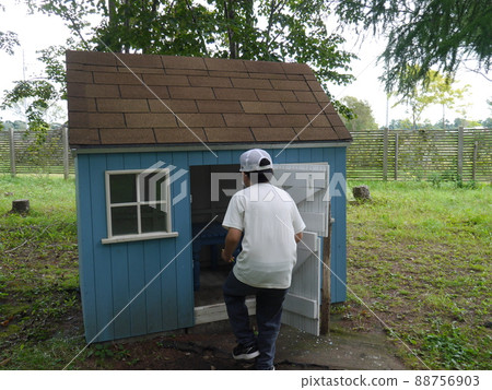 Children's hut set up in the garden Children's hut set up in the garden 88756903