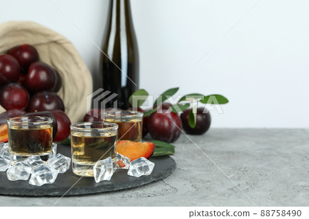 Concept of alcohol with plum vodka, space for text Concept of alcohol with plum vodka, space for text 88758490