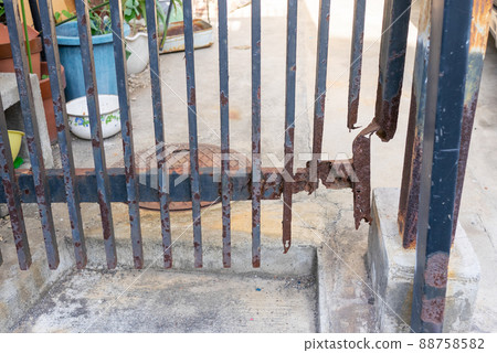 Old rusty and corroded gate 88758582