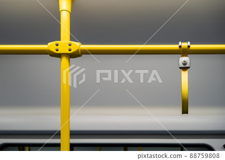 Close up the rubber - plastic cable hand holding in ariport rail link train. Close up the rubber - plastic cable hand holding in ariport rail link train. 88759808