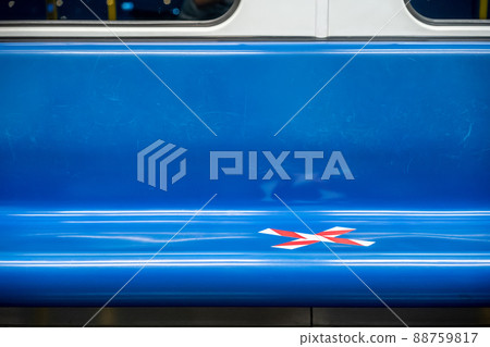 blue seat row in the train with crossed marking tape in Coronavirus (COVID-19) period. It means Social Distancing in transportation. blue seat row in the train with crossed marking tape in Coronavirus (COVID-19) period. It means Social Distancing in transportation. 88759817